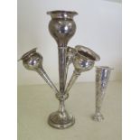 A silver hallmarked Epergne and a silver hallmarked trumpet vase decorated with foliate embossed