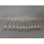 A set of eleven George III old English pattern table forks by Richard Crossley and George Smith IV