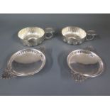 A pair of silver twin handled pierced dishes - Edinburgh 1909/10 - Weight approx.