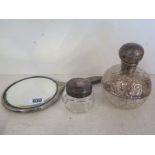 A silver topped and mounted Cologne bottle - Height 14 cm - top rim needs attention,