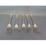 A matched set of five George III and George IV old English pattern table forks - including three by