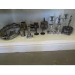 A quantity of silver plated items including tray, crumb scoop and brush, candelabra,