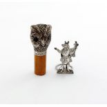 A novelty silver cane/parasol handle, by Whitaker and Davis, London 1919, modelled as an owl's head,