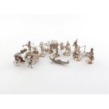 A collection of Chinese silver miniature figures, Hong King made, comprising: a set of ten menu card