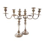 A pair of Old Sheffield plated three-light candelabra, circa 1820, tapering circular form, gadroon