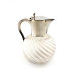 An electroplated-mounted claret jug, swirl fluted globular form, the plain mount with a scroll