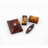 A small collection of four items of tortoiseshell, comprising: a George III toothpick box, oval