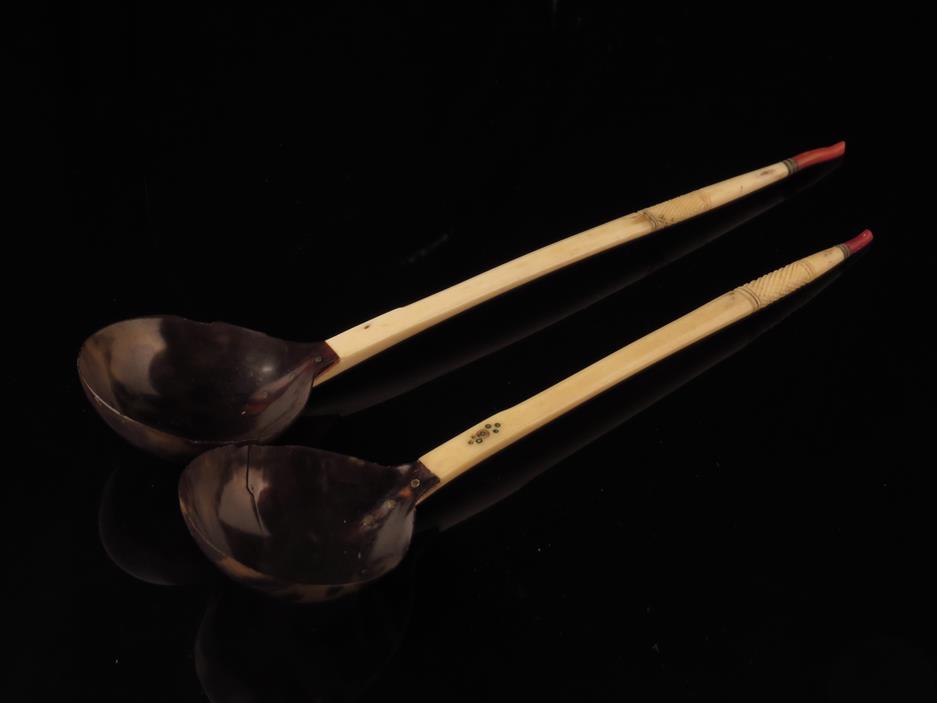 λ Two Ottoman sherbet spoons, each with a coral terminal to an ivory stem and a tortoiseshell