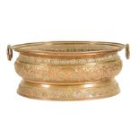 A copper wine cistern, repousée decorated with bands of scrolling flowers and leaves, with ring