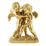 A 19th century French ormolu group of two wrestling putti, 28.5cm high, 21.5cm wide, 15.3cm deep.
