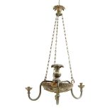 A Regency gilt and patinated bronze colza three light chandelier, with a stiff leaf corona hung with