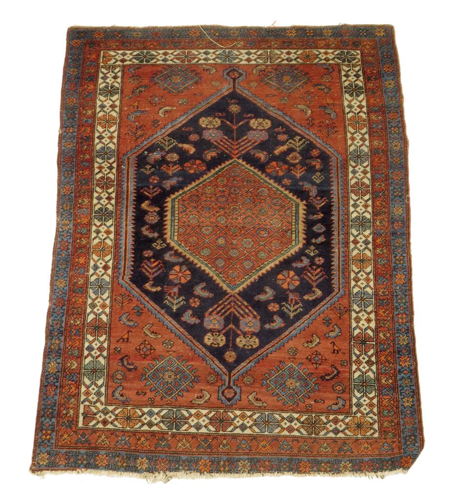 A north west Persia rug, c.1920-30, 192 x 145cm.
 
Lot 4 – a north west Persian rug.  Overall a