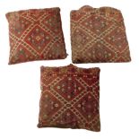 Three cushions covered with Ersari Turkmen of Beshir fragments, the fragments mid 19th century