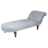 A Victorian chaise longue, on turned walnut legs, 72cm high, 179cm wide, 61cm deep.