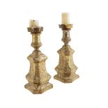 A pair of Italian silvered wood altar candlesticks, each with a detachable metal sconce above a