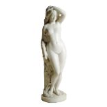 Marshall Wood (1834-1882). A carved marble model of Daphne, standing with her back to a laurel tree,