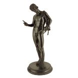 After the antique. A late 19th century Italian bronze model of Narcissus, the circular base