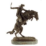 After Frederic Remington (American, 1861-1909).  A bronze group of the 'BRONCO BUSTER', late 20th