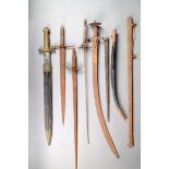 A French side arm by Talabot, Paris, 19th century, with scabbard, two theatrical swords, a tulwar,