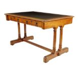 A Victorian oak writing table by A.W.N. Pugin by Holland & Sons, the moulded edge top inset a