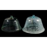 Two glass bell shaped covers, each with a handle, 33cm high, 46.7cm diameter, max. (2)