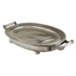 A George III pewter warming meat plate, with a pair of handles on ball feet, the underside