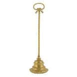 A Victorian brass doorstop, with a rope twist handle and stem, stamped '4654', 51.8cm high, 15cm