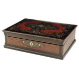 A Napoleon III ebonized and marquetry box by Paul Sormani, with amboyna panels and inlaid with brass