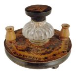 A Victorian Tunbridge ware inkwell, decorated with a micromosaic wreath with two pen holders and a