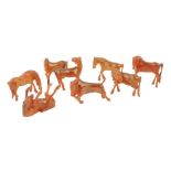 A set of eight Chinese horses of Wu Mang, possibly carved of stained horn, 20th century, 5.6cm high,