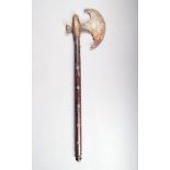 An early 19th century Indian fighting axe, with pierced crescent blade and silver rosettes on