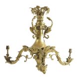 A 19th century gilt brass chandelier, decorated with dragons and with three leaf and scroll arms,