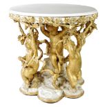 A 19th century Italian giltwood and composition centre table, the circular marble top above a vine