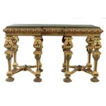 A continental painted gilt and composition side table in Baroque style, the later leatherette top