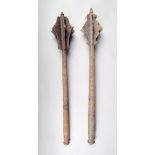 A cast iron mace, 63cm long and another mace, 60cm long. (2)Provenance: The Property of a Nobleman.