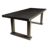 An ebonized dining table designed by Christian Liaigre, modern, 72cm high, 198.9cm wide, 85cm deep.