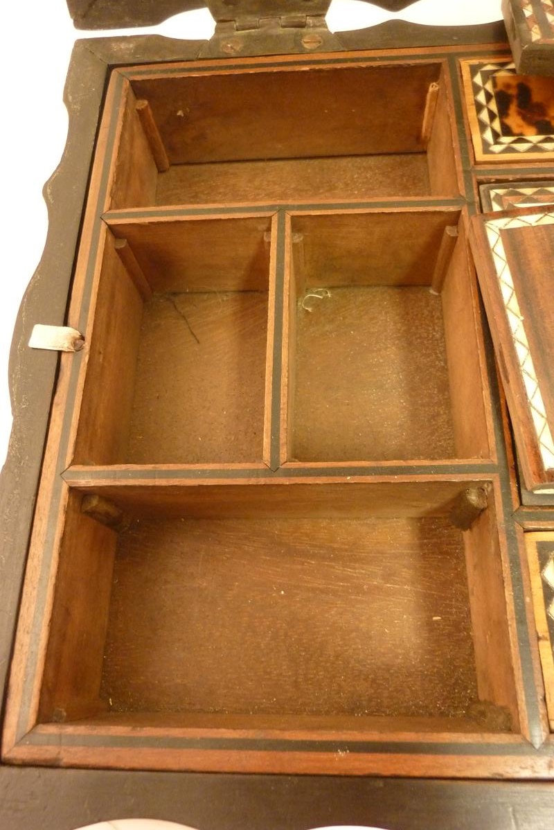 λ A 19th century Ceylonese macassar ebony workbox, of scalloped outline, the interior with inlay - Image 9 of 17