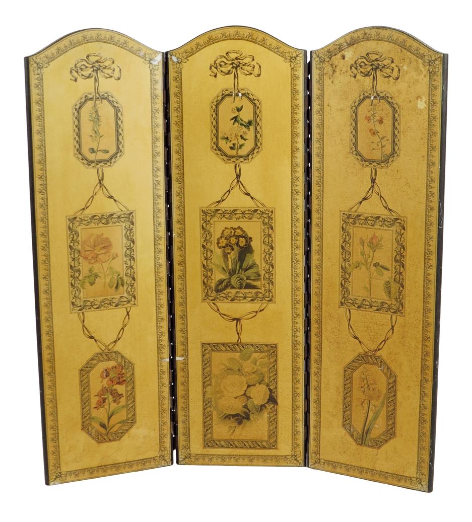 A three-fold découpage screen, the arched top above printed panels of ribbon tied frames with panels