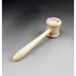 λ A Victorian turned ivory gavel, with the initials 'A.F.Q', 15.9cm long.