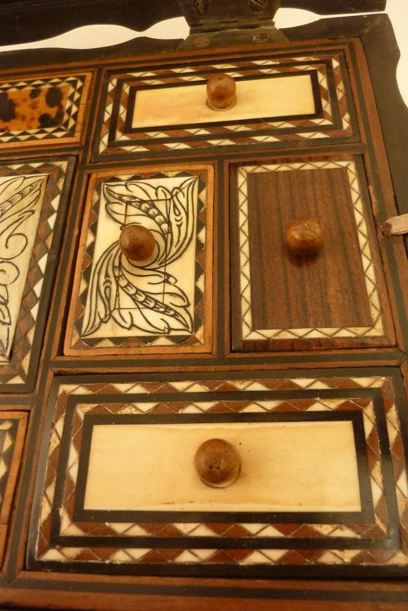 λ A 19th century Ceylonese macassar ebony workbox, of scalloped outline, the interior with inlay - Image 4 of 17