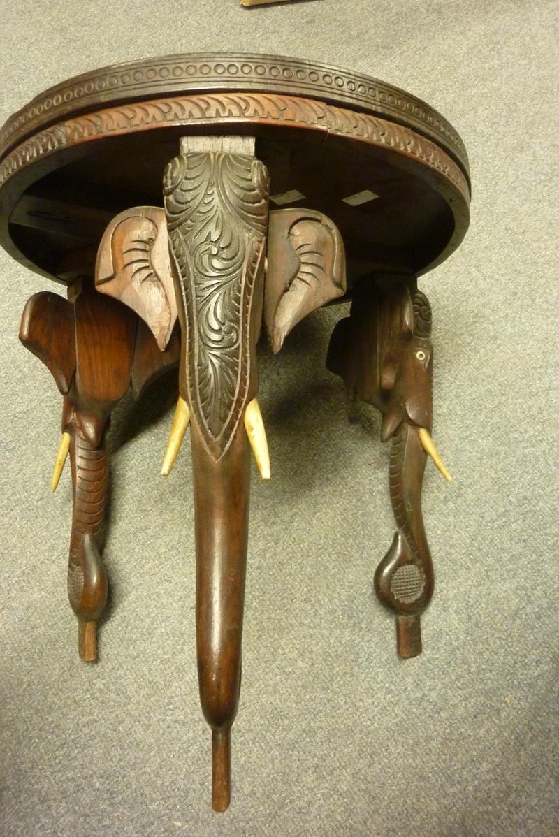 An Indian hardwood occasional table, on three elephant's head and trunk legs, late 19th / early 20th - Image 5 of 7