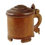 A Norwegian birch tankard, the hinged lid centred with a swirl rondel above a zig - zag moulded