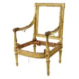A Louis XVI style carved giltwood fauteuil after the model by Jean-Baptiste Sené, the leaf and