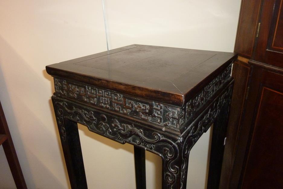 A pair of Chinese hardwood jardinière stands, each with a panelled top above a carved frieze - Image 16 of 28