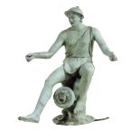 An Italian bronze fountain head, in the form of a Neapolitan fisherman standing on a rocky outcrop