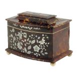 λ An early Victorian tortoiseshell pagoda shape tea caddy, inlaid with pewter stringing, the front