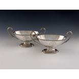 A pair of George III silver two-handled sauce tureen bases, by Carter, Smith and Sharp, London 1780,