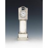An Edwardian silver clock, by The Douglas Clock Company, Birmingham 1902, modelled as a long case