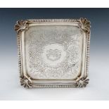 A George II silver waiter, by George Wickes, London 1742, square form, gadroon and shell border, the