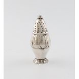 By Georg Jensen, a Danish silver pepper pot, design number 198, with import marks for London 1924,